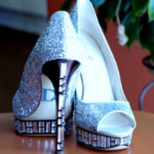 Silver high heeled party shoe
